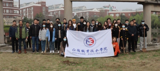 我系学生积极参加“绿色和谐，你我同盟”植树活动